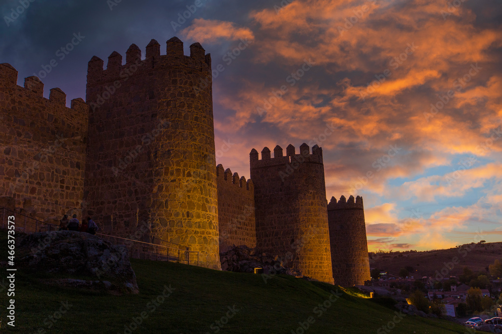Avila city wall one afternoon with a beautiful sunset, Spain