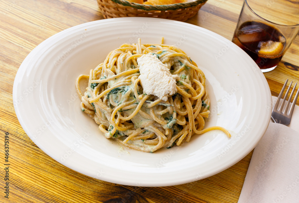 Delicious pasta with ricotta and spinach. Italian cuisine