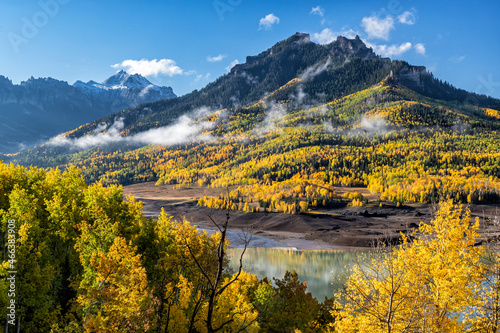 Fototapeta Naklejka Na Ścianę i Meble -  Clouds and Fall Foliage above Silverjack Reservoir