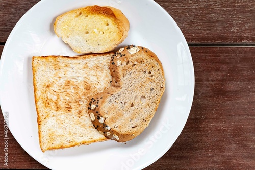 Breakfast plate, toast and jam with butter