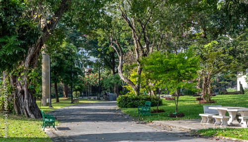 Fototapeta Naklejka Na Ścianę i Meble -  Pathway through Rommaninat Park, also known as Khut Kao Park, in downtown Bangkok