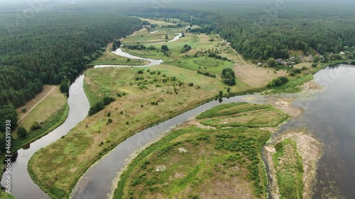 Nemunas and Merkys river confluence near town of Merkine, aerial drone view photo