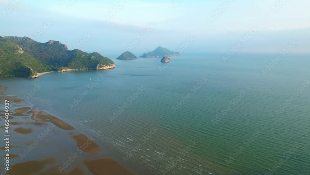 4K aerial drone view of landscape, Flight over sea. A beautiful island located close to the coast. the beautiful sea of the tropics in Thailand. Cinematic drone shot.
4K aerial drone view of landscape, Flight over sea. A beautiful island located close to the coast. the beautiful sea of the tropics in Thailand. Cinematic drone shot.