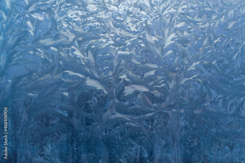 Beautiful drawing of frost on the glass of the car.