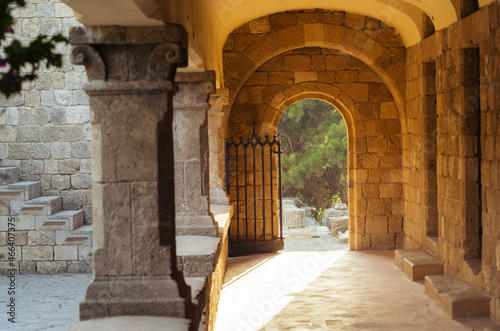 Castle gate way to yard of ancient greek temple