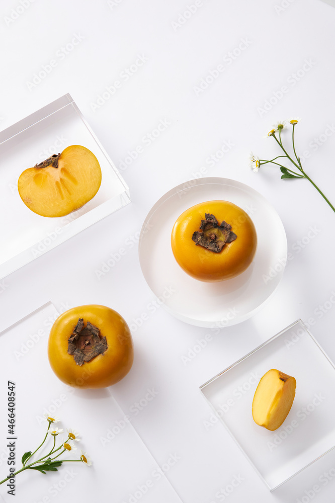 Topview of persimmon and seeds in the petri dish with transparent podium on white background. Research and develop cosmetics in laboratory for advertising
Topview of persimmon and seeds in the petri dish with transparent podium on white background. Research and develop cosmetics in laboratory for advertising