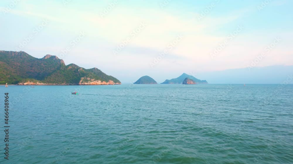 4K aerial drone view of landscape, Flight over sea. A beautiful island located close to the coast. the beautiful sea of the tropics in Thailand. Cinematic drone shot.
4K aerial drone view of landscape, Flight over sea. A beautiful island located close to the coast. the beautiful sea of the tropics in Thailand. Cinematic drone shot.