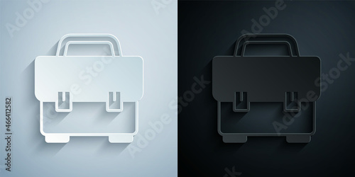 Paper cut Toolbox icon isolated on grey and black background. Tool box sign. Paper art style. Vector
