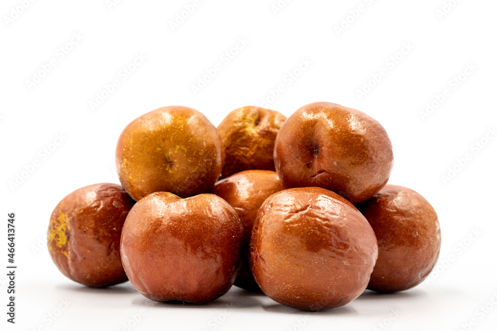 Jujube on a white background. Combined with a ripe jujube shade. Close up Jujube on a white background. Combined with a ripe jujube shade. Close up