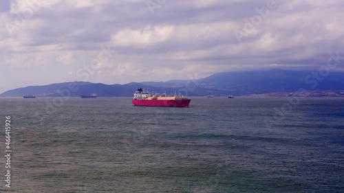 Wide shot of bay of Gibraltar with cargo ships on the sea
