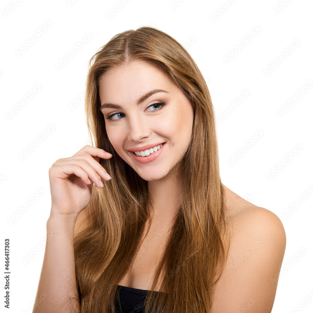 Young attractive woman with perfect make-up and long fair hair posing and smiling at studio over white background, beauty female portrait. Young attractive woman with perfect make-up and long fair hair posing and smiling at studio over white background, beauty female portrait.