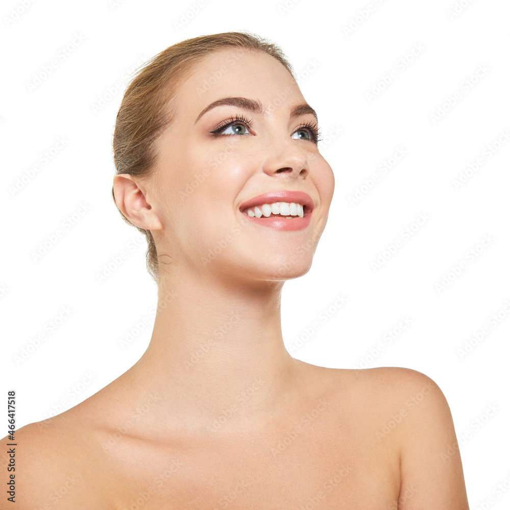 Young attractive woman posing at studio and happy smiling over white background. Beautiful girl with perfect smile.