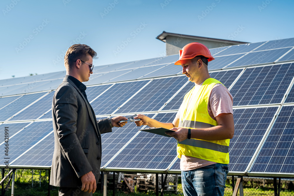 foreman receives a salary from a businessman after work on the installation of solar panels foreman receives a salary from a businessman after work on the installation of solar panels