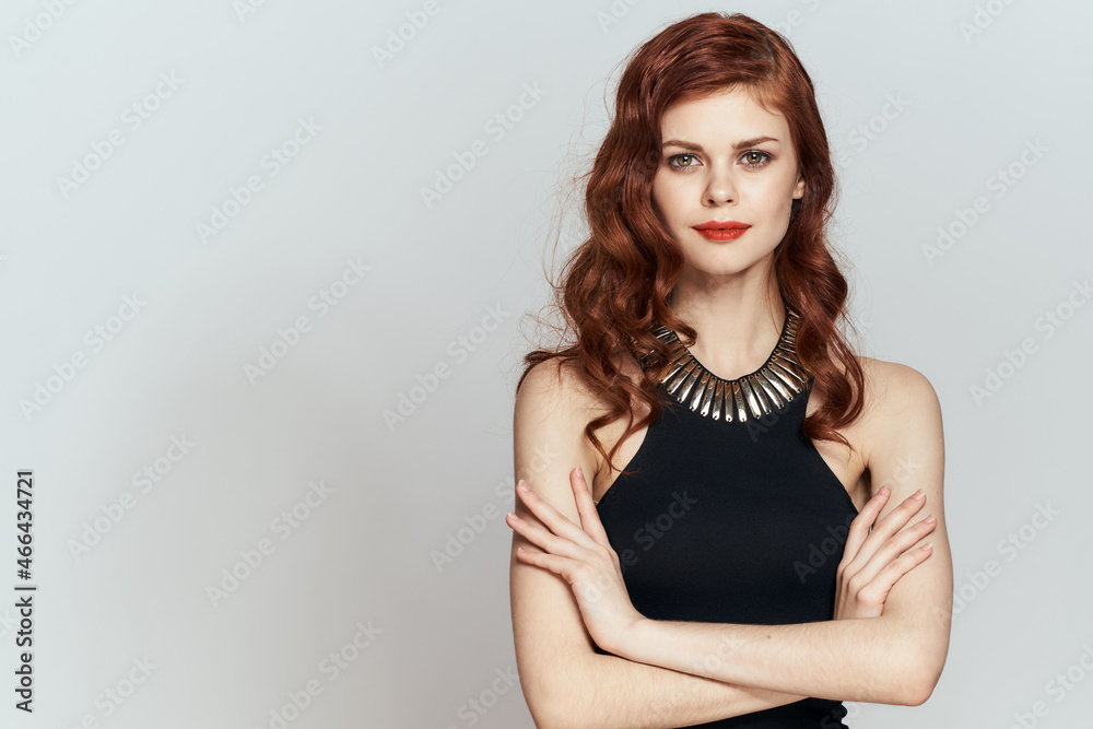 red-haired woman in black dress red lips glamor posing red-haired woman in black dress red lips glamor posing