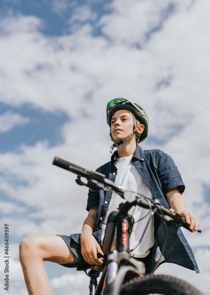 Boy on a bike, summer hobby