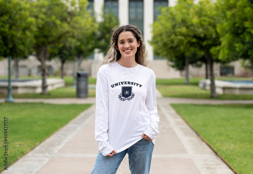 Girl wearing university jumper at campus, college apparel photo