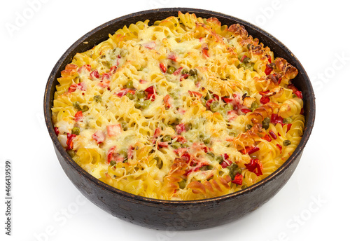 Baked casserole with spiral pasta, vegetables and cheese in pan
