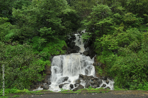 Scenic waterfall on the way to Murud-Janjira tourist spot in Raigad district of Maharashtra, India photo