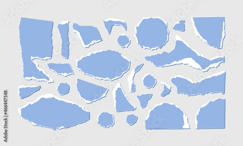 Torn blue paper with white edge isolated on grey background. Vector illustration of small scraps of torn paper of different sizes and shapes. Crumbled colored pieces of pages.