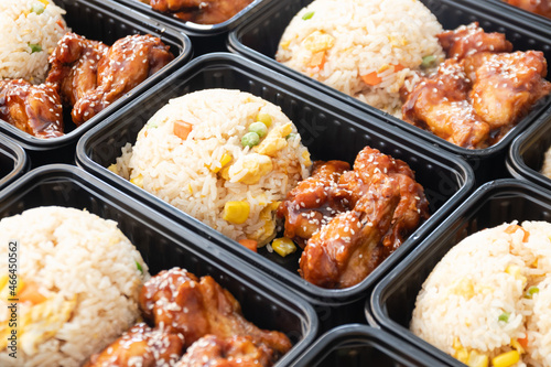 Japanese bento box, Japanese food lunch boxes in plastic packages. Fried rice with Teriyaki chicken.