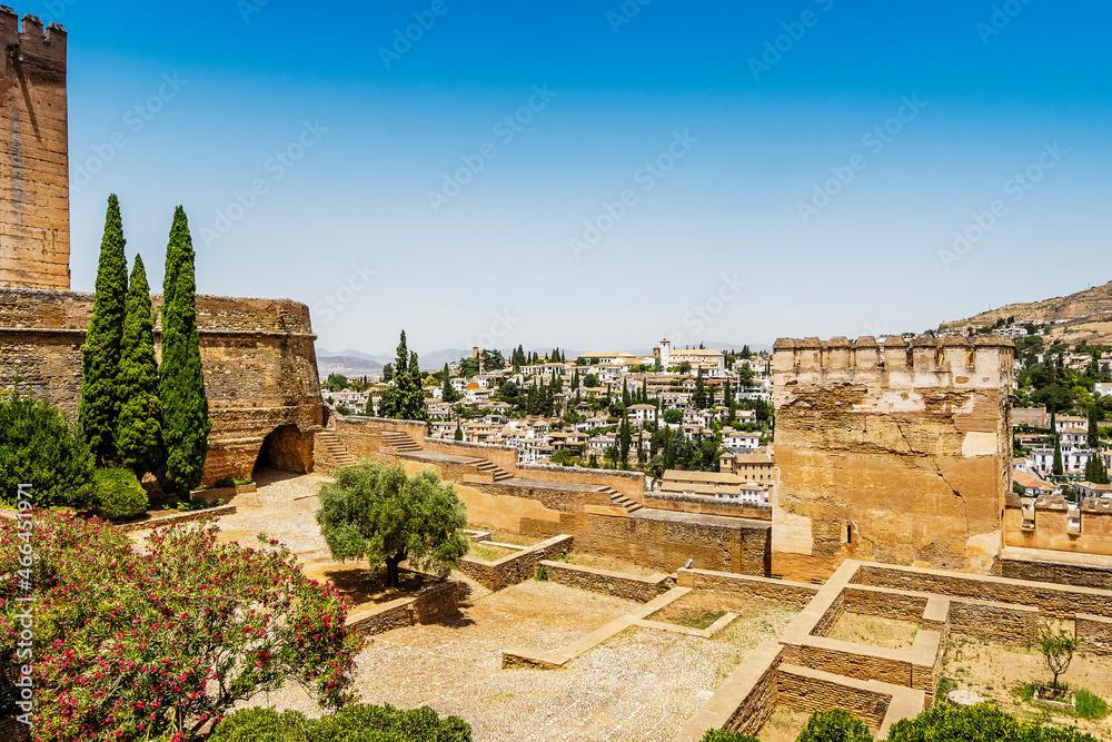 Alhambra palace complex in the foreground and city of Granada in the background, Spain
