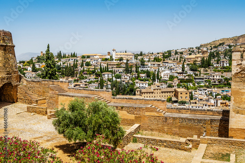 Alhambra palace complex in the foreground and city of Granada in the background, Spain