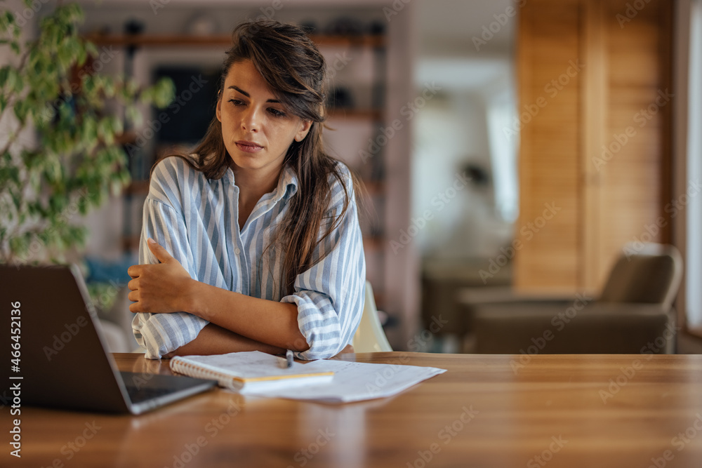 Adult woman, checking her work progress