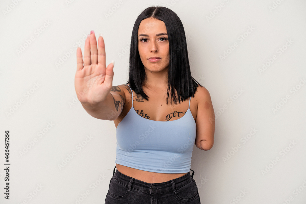 Young caucasian woman with one arm isolated on white background standing with outstretched hand showing stop sign, preventing you. Young caucasian woman with one arm isolated on white background standing with outstretched hand showing stop sign, preventing you.