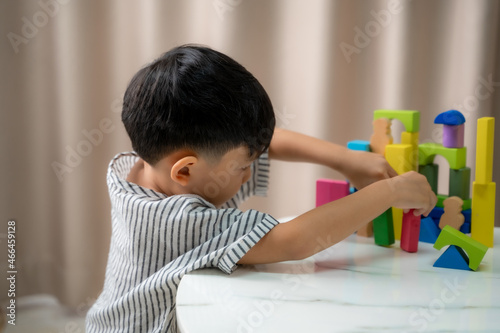 Children playing with toy building blocks at home,Educational toys for child.