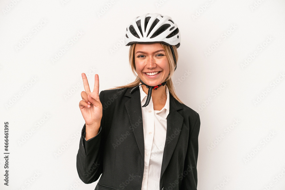 Young caucasian business woman wearing a bike helmet isolated on white background showing number two with fingers. Young caucasian business woman wearing a bike helmet isolated on white background showing number two with fingers.