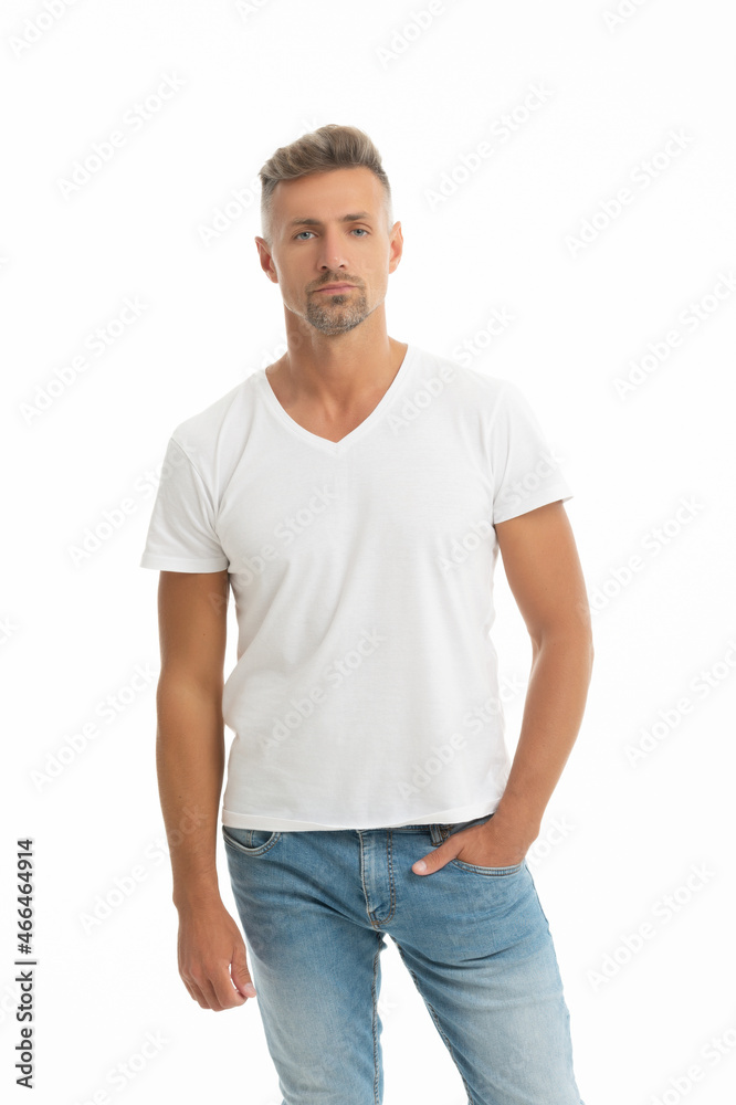 Keep it simple. Serious man isolated on white. Handsome man in white tshirt. Caucasian guy Keep it simple. Serious man isolated on white. Handsome man in white tshirt. Caucasian guy