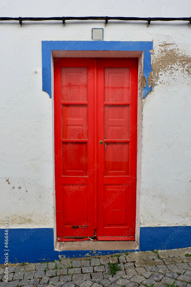 Vintage double door in Arronches, Portalegre, Portugal. Aged authentic entrance in downtown district