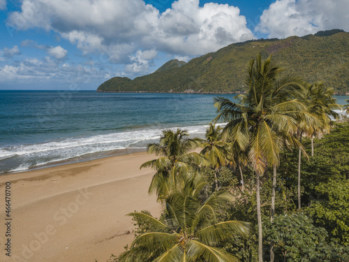 Landscape of El Valle Beach surrounded by greenery and sea in Samana, the Dominican Republic photo