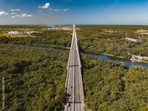 Mauricio Baez Bridge surrounded by greenery on a sunny day in the Dominican Republic photo