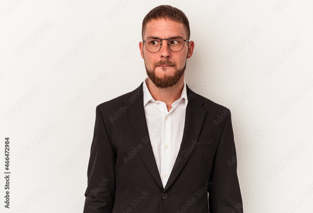 Young business caucasian man isolated on white background confused, feels doubtful and unsure. Young business caucasian man isolated on white background confused, feels doubtful and unsure.