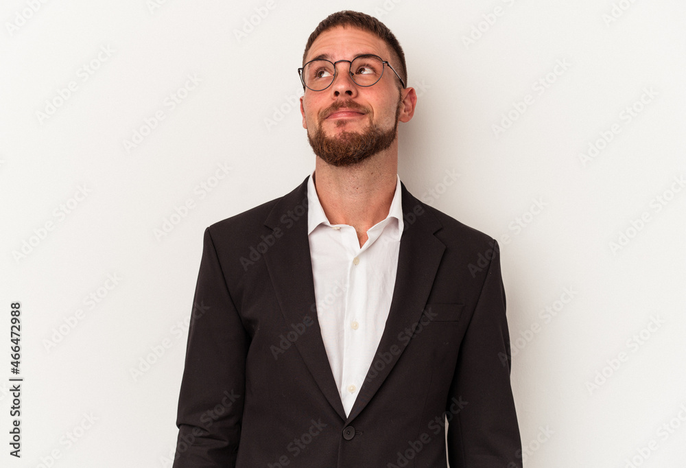 Young business caucasian man isolated on white background dreaming of achieving goals and purposes Young business caucasian man isolated on white background dreaming of achieving goals and purposes