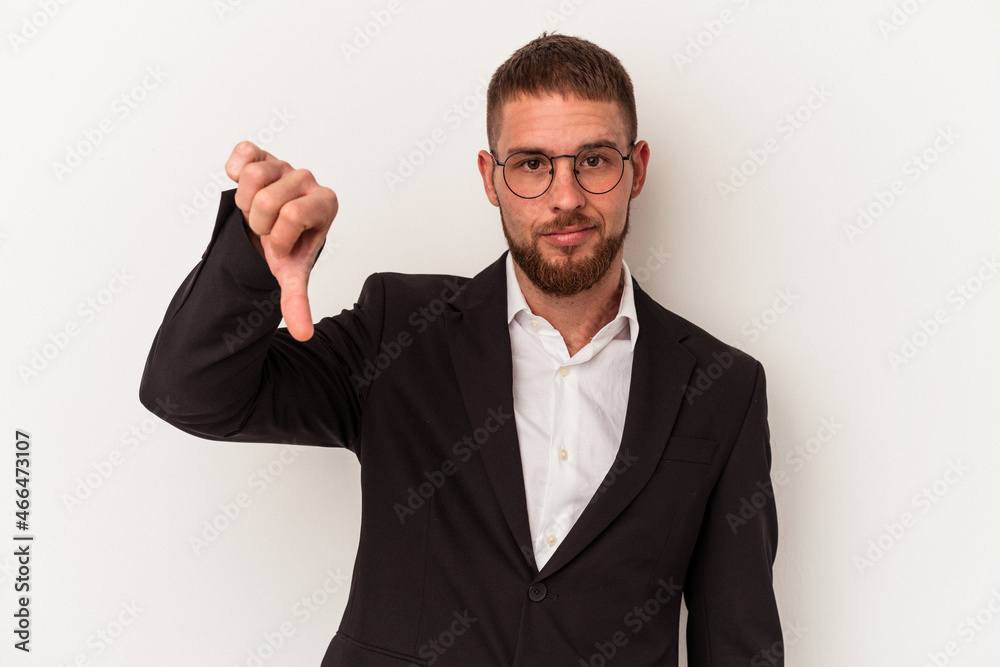 Young business caucasian man isolated on white background showing a dislike gesture, thumbs down. Disagreement concept. Young business caucasian man isolated on white background showing a dislike gesture, thumbs down. Disagreement concept.