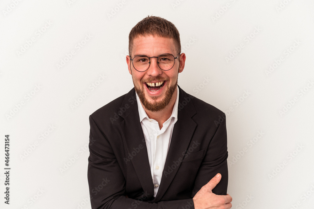 Young business caucasian man isolated on white background laughing and having fun. Young business caucasian man isolated on white background laughing and having fun.