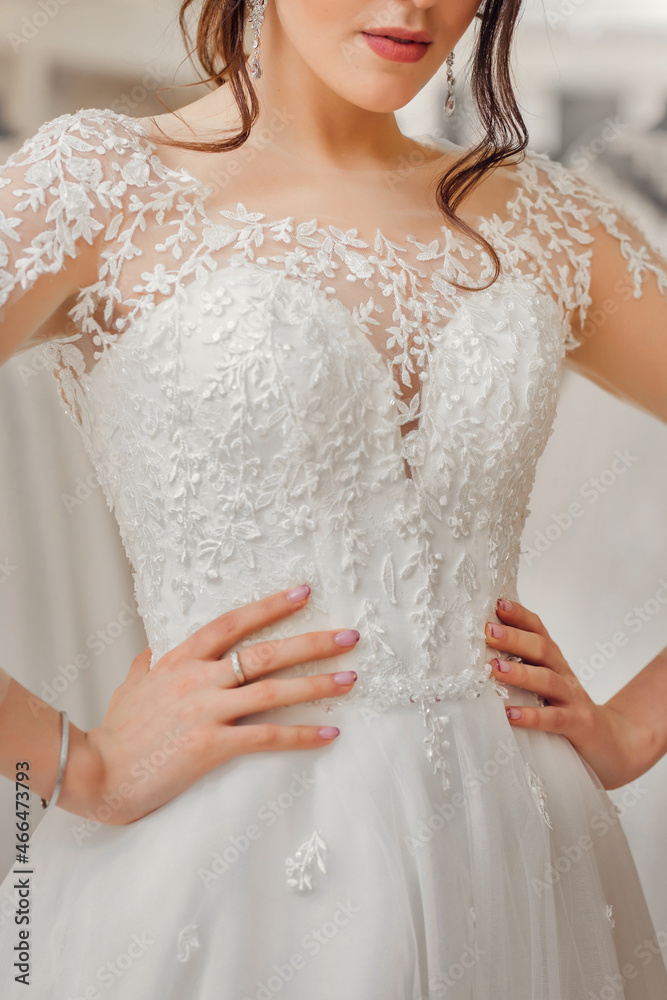 bride in a beautiful wedding dress with lace