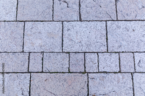 Paving stones are carefully arranged.