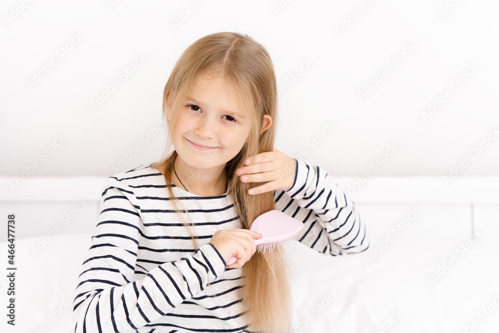little girl brushing her hair little girl brushing her hair