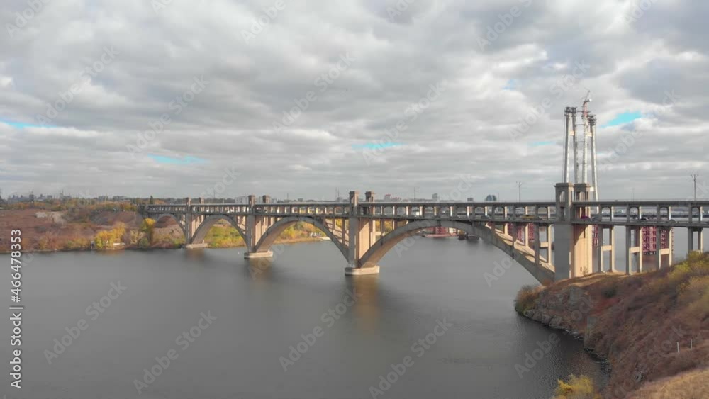 River monumental bridge aerial cloudscape River monumental bridge aerial cloudscape