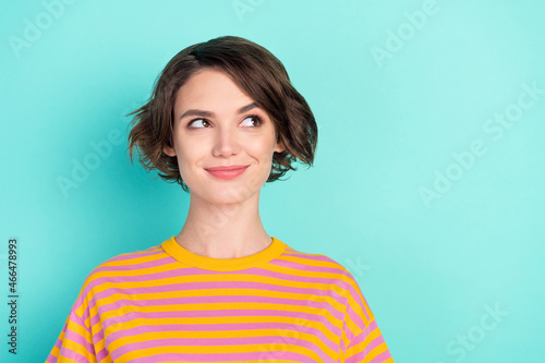 Portrait of attractive cheery brainy girlish minded girl thinking copy space isolated over bright teal turquoise color background