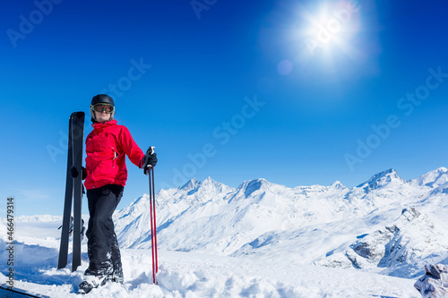 Young Man On Ski Holiday In the Mountains