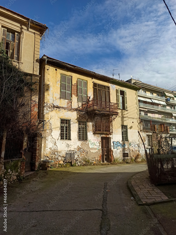 Old abandoned building and street view in the town Drama of North Greece