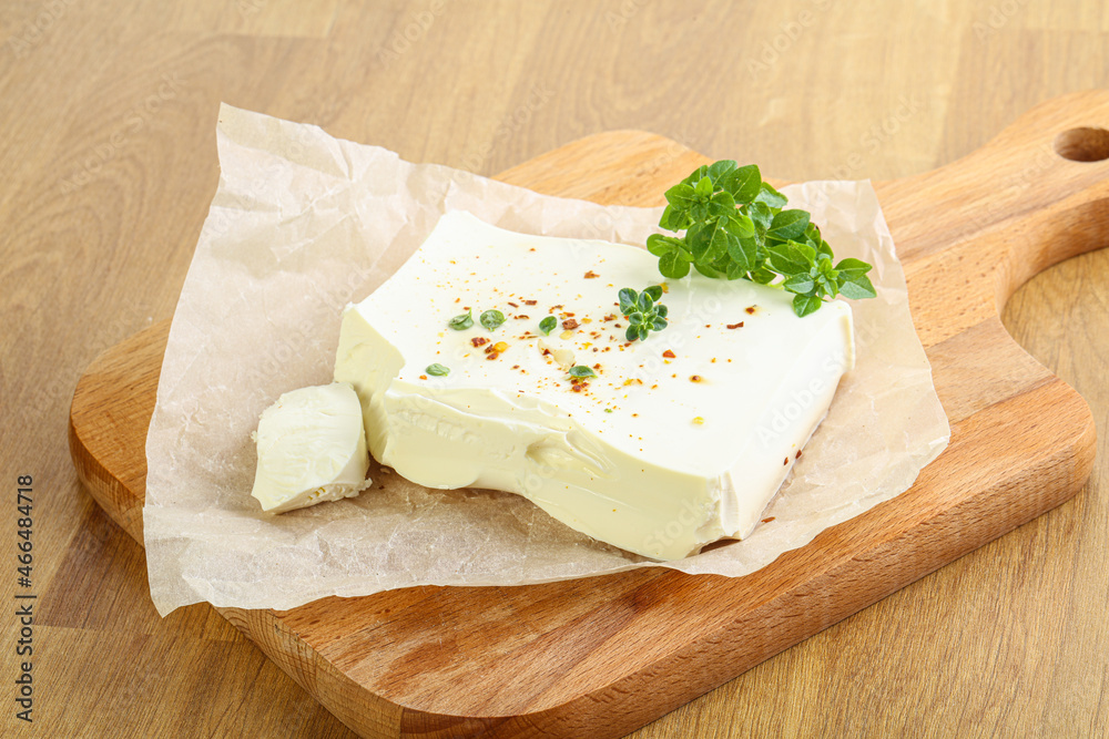 Greek Feta cheese over board