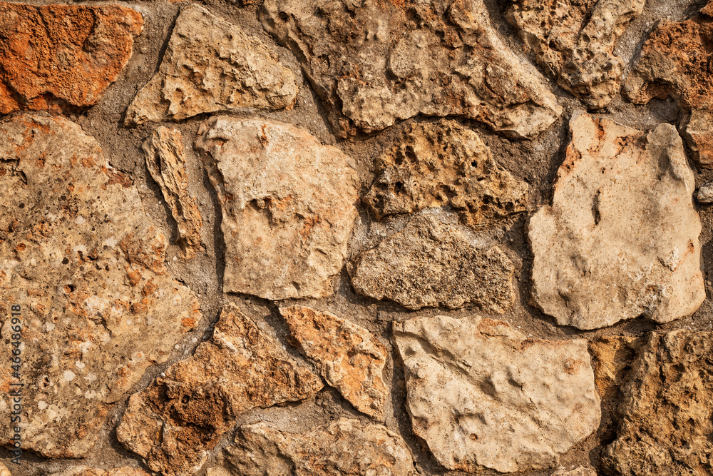 Modern seamless wall made of natural red and white stone, background and texture of old brick walls. Modern seamless wall made of natural red and white stone, background and texture of old brick walls.