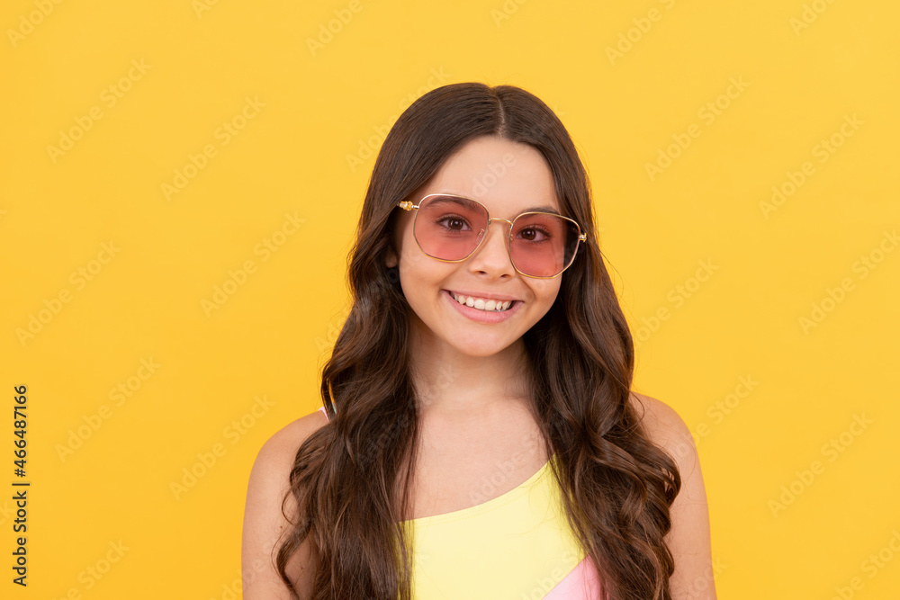 beach party. summer vacation. beauty portrait face. child with long hair wear glasses.