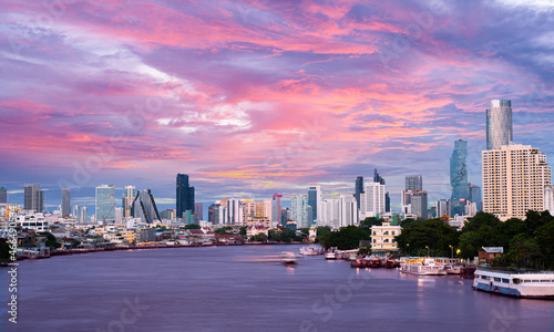 city riverside in the evening showing city skyline © missisya