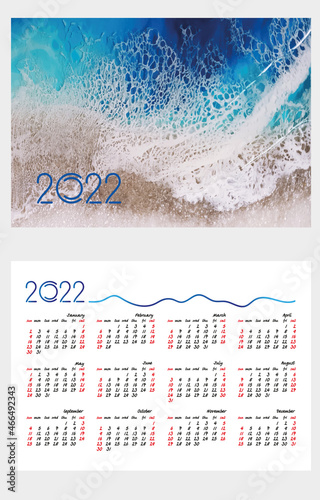 Layout of a pocket calendar with a grid for 2022. Sea background, waves and sea foam. English version of the grid. The week starts on Sunday